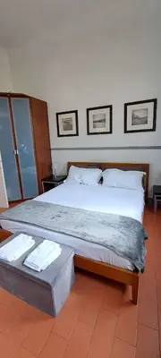 Letto o letti in una camera di Sunny home with roof patio