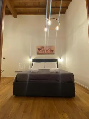 Letto o letti in una camera di New Residenza Dei Cerchi