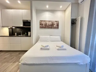 Letto o letti in una camera di CDM Studio by FlorenceHospitality com