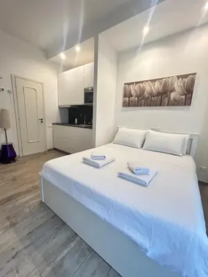 Letto o letti in una camera di CDM Studio by FlorenceHospitality com
