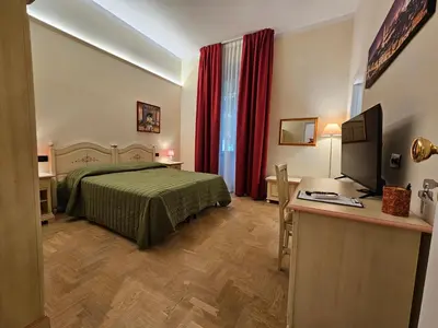 Letto o letti in una camera di Resort del Roster