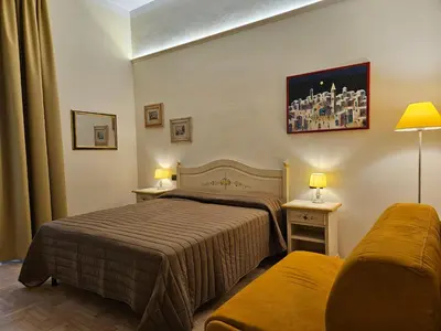 Letto o letti in una camera di Resort del Roster