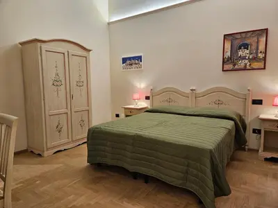 Letto o letti in una camera di Resort del Roster