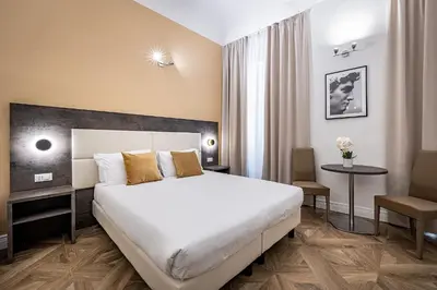 Letto o letti in una camera di B&B De Biffi