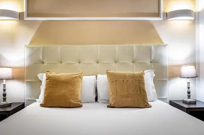 Letto o letti in una camera di B&B De Biffi
