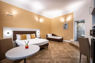 Letto o letti in una camera di B&B De Biffi