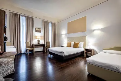 Letto o letti in una camera di B&B De Biffi