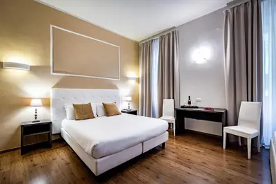 Letto o letti in una camera di B&B De Biffi
