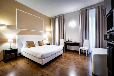 Letto o letti in una camera di B&B De Biffi