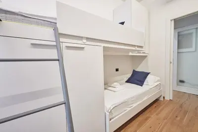 Letto o letti in una camera di [San Donato] Jewel Apartment