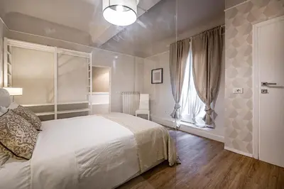 Letto o letti in una camera di Florentine Experience in Santa Croce