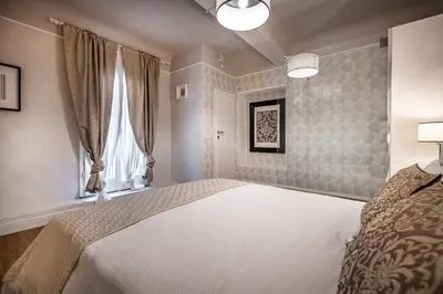 Letto o letti in una camera di Florentine Experience in Santa Croce