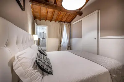 Letto o letti in una camera di Florentine Experience in Santa Croce