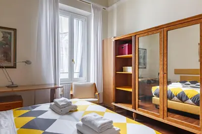 Letto o letti in una camera di GuestHost - Stibbert & Statuto Elegant Flat with Balcony