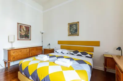 Letto o letti in una camera di GuestHost - Stibbert & Statuto Elegant Flat with Balcony