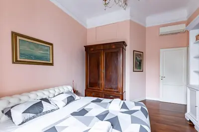 Letto o letti in una camera di GuestHost - Stibbert & Statuto Elegant Flat with Balcony