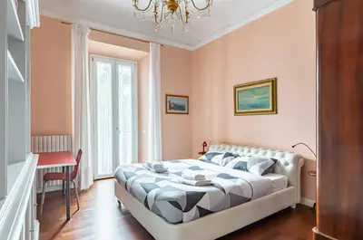 Letto o letti in una camera di GuestHost - Stibbert & Statuto Elegant Flat with Balcony