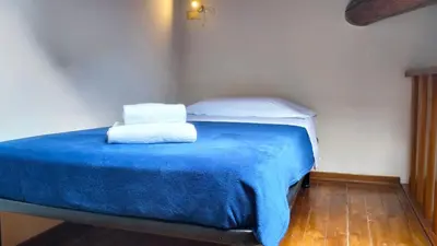 Letto o letti in una camera di Small Heaven in Florentine hills