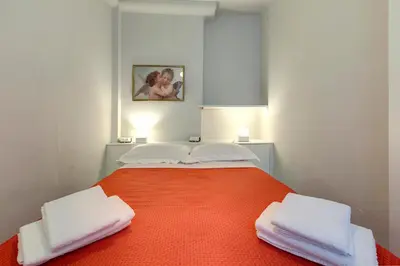 Letto o letti in una camera di Uffizi Apartment