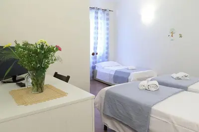 Letto o letti in una camera di Mia Palace