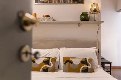 Letto o letti in una camera di Marili Apartment