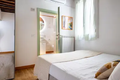 Letto o letti in una camera di Marili Apartment