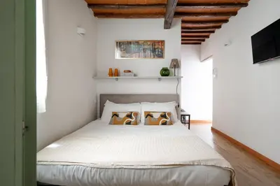 Letto o letti in una camera di Marili Apartment
