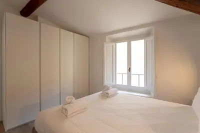 Letto o letti in una camera di Piazza Dei Rossi Due View