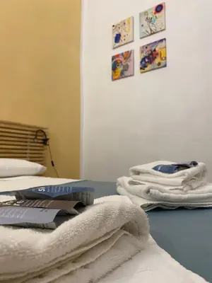 Letto o letti in una camera di da I' Gini GuestHouse