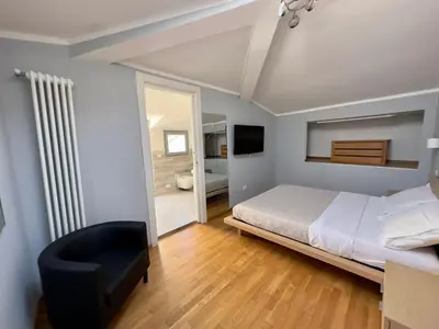 Letto o letti in una camera di Sweet Home Desiree