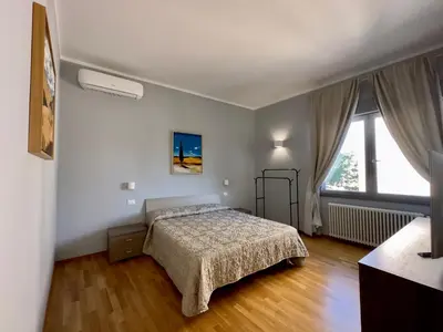 Letto o letti in una camera di Sweet Home Desiree