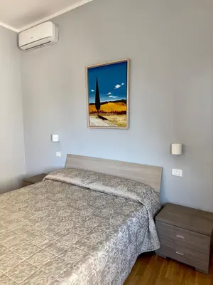 Letto o letti in una camera di Sweet Home Desiree