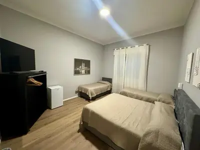 Letto o letti in una camera di Sweet Home Desiree