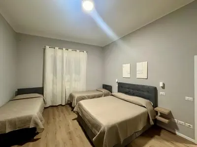 Letto o letti in una camera di Sweet Home Desiree