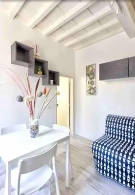 Area soggiorno di Florence City Suite