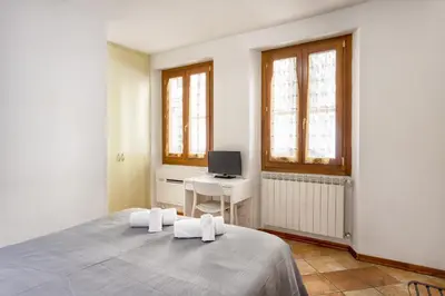 Letto o letti in una camera di Fiume & Zannoni Apartments by 360Rentals