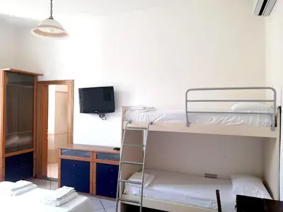Letto o letti in una camera di Fiume & Zannoni Apartments by 360Rentals