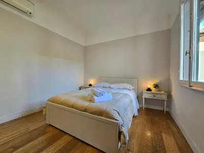 Letto o letti in una camera di [Ognissanti] Excelsior Apartment