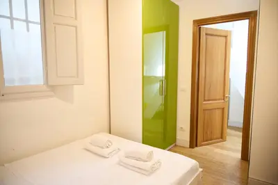 Letto o letti in una camera di [Ognissanti] Excelsior Apartment