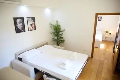 Letto o letti in una camera di [Ognissanti] Excelsior Apartment