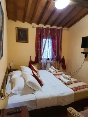Letto o letti in una camera di Apartment Very Central 100m from train station&Duomo