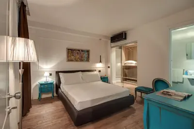 Letto o letti in una camera di Residenza d'epoca Borgo Albizi