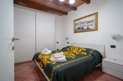 Letto o letti in una camera di Fiorino Apartment - Piazza della Libertà