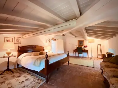 Letto o letti in una camera di Mansarda Isabella