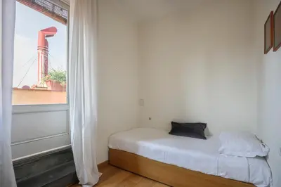 Letto o letti in una camera di Apartment with terrace facing Duomo