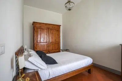 Letto o letti in una camera di Apartment with terrace facing Duomo