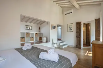 Letto o letti in una camera di Panoramic loft with terrace near Ponte Vecchio