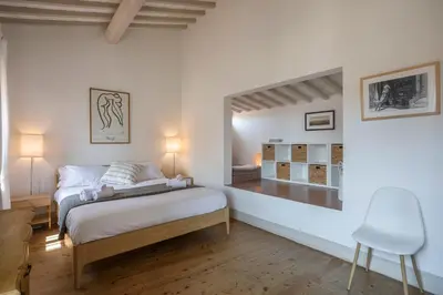 Letto o letti in una camera di Panoramic loft with terrace near Ponte Vecchio