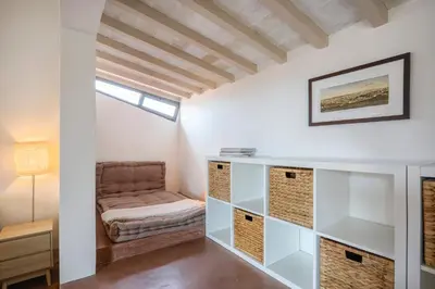 Letto o letti in una camera di Panoramic loft with terrace near Ponte Vecchio