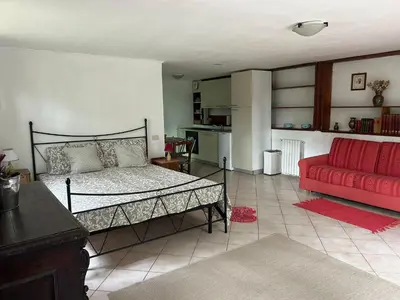 Letto o letti in una camera di Open Space nel Parco con parcheggio gratuito